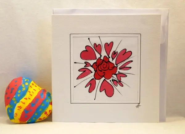 "Роза целуната от ореол сърца"