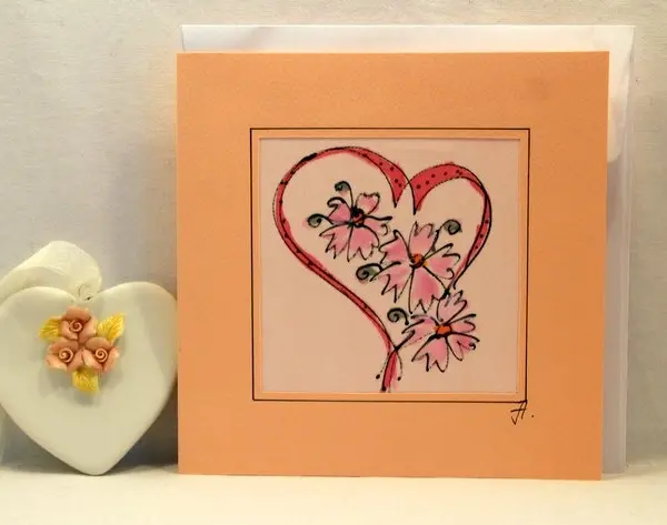 "Сърцевиден венец с Цветя"